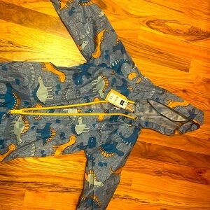 Dinosaur all in one rain suit 3/4 years old. Never worn
